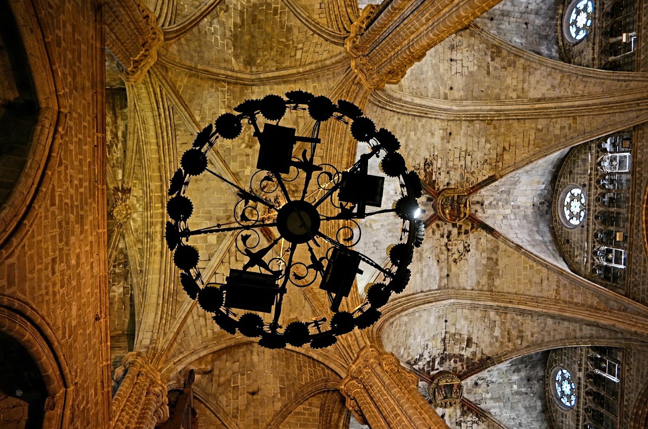 Ornate interior viewed upward with a circular chandelier